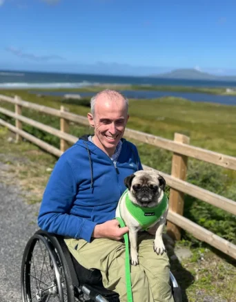 Gary Alle and his dog {{brizy_dc_image_alt imageSrc=